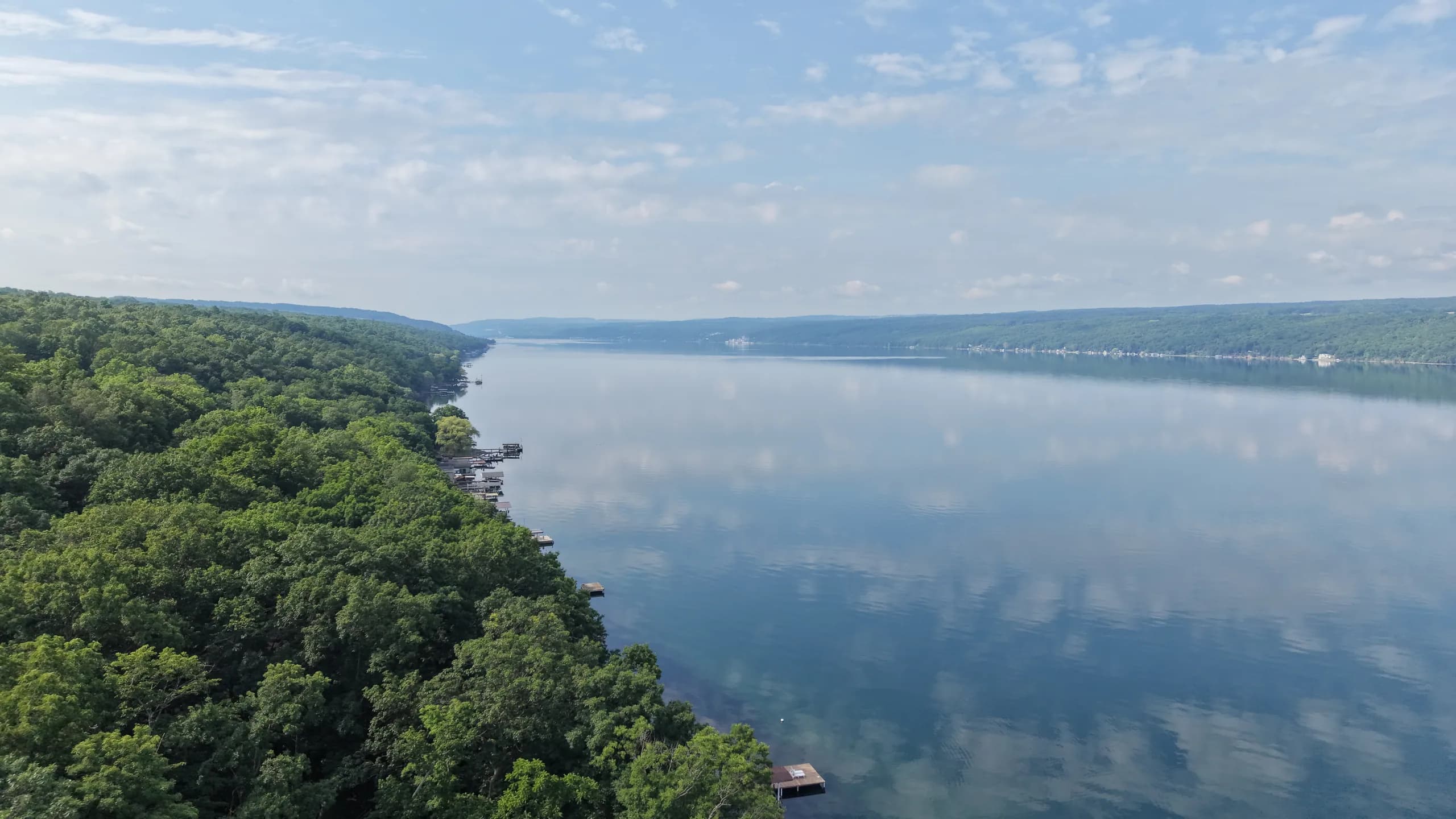 Morning drone view of the east shore with private dock visible